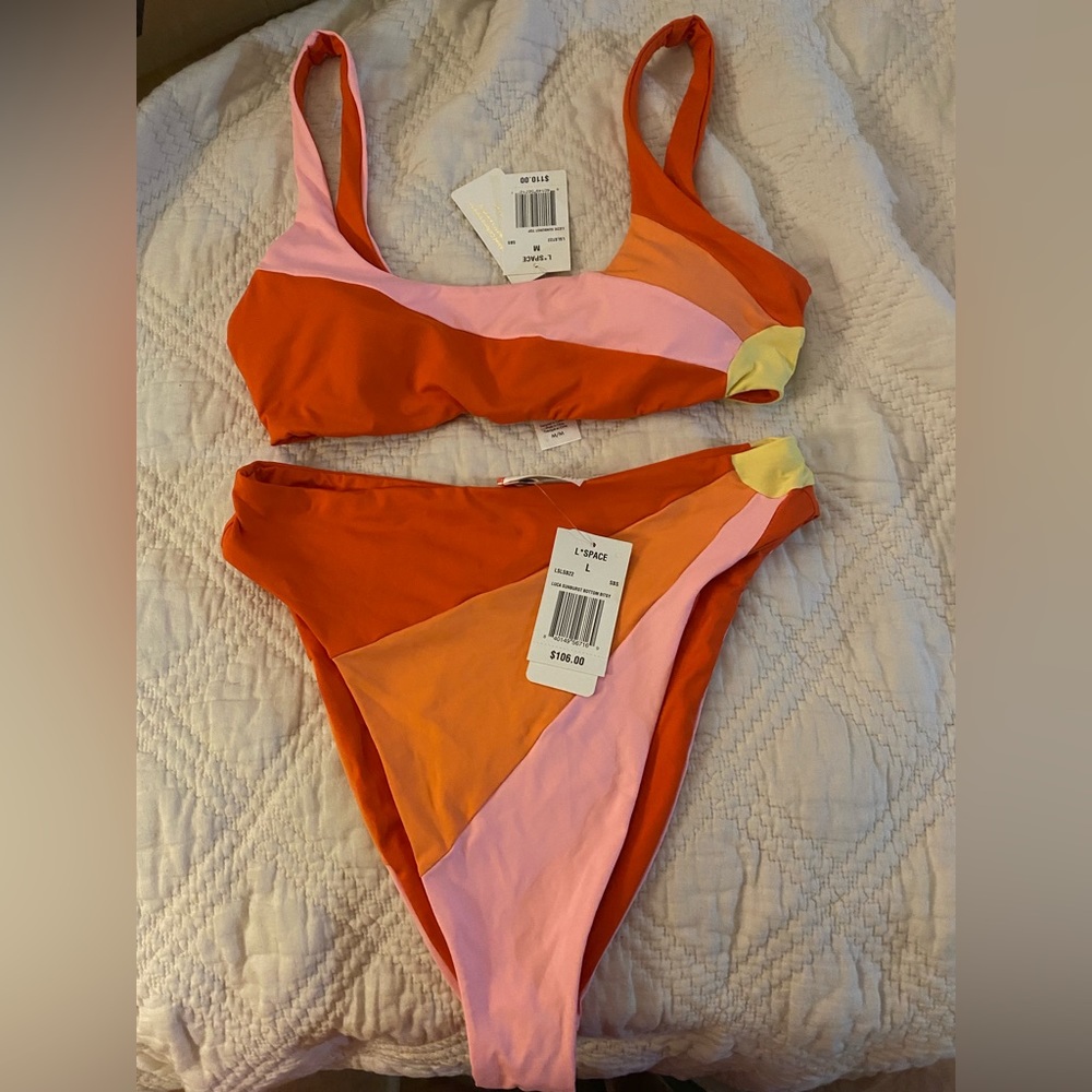 L space bikini never worn. Top M bottom L